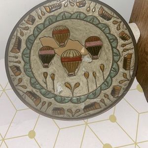 Decorative brass plate .